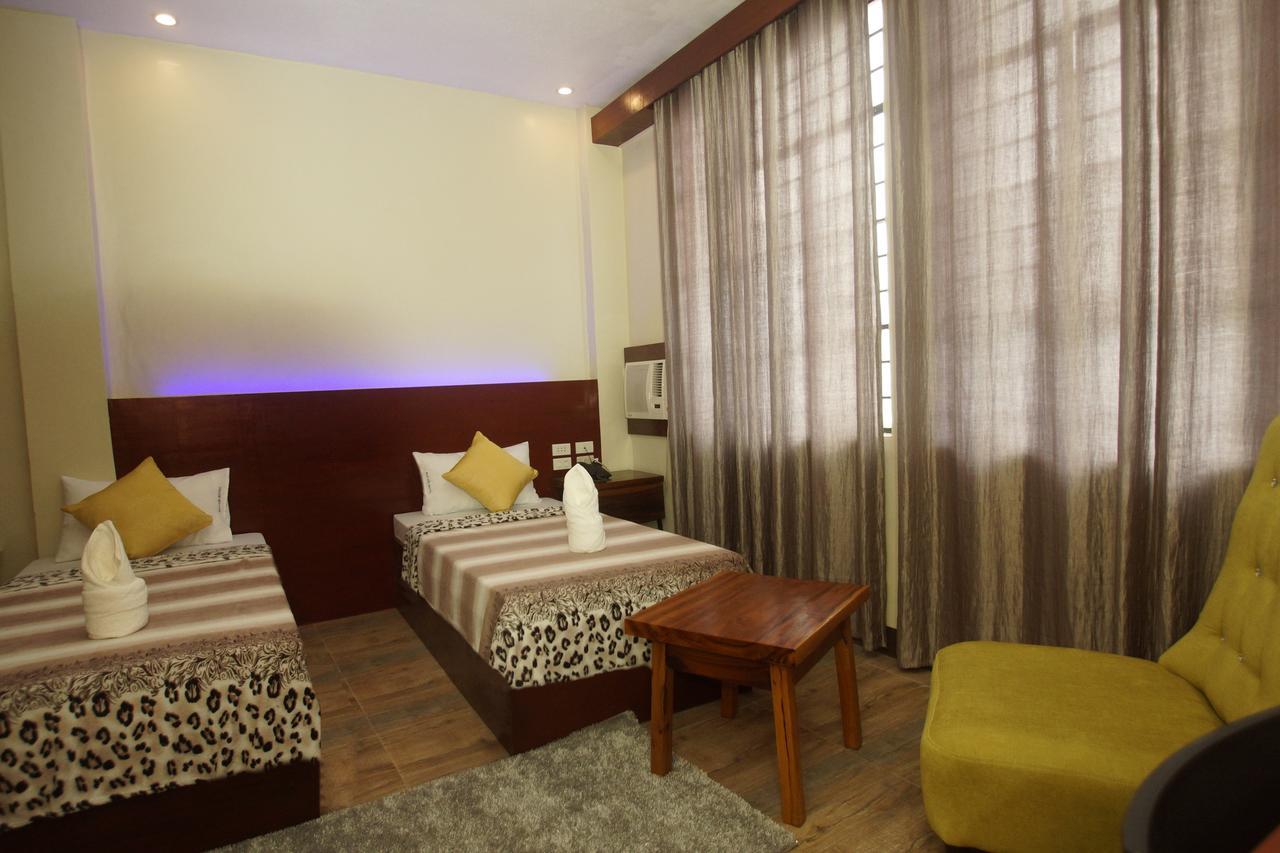 Hacasi Hotel Anibong Extérieur photo
